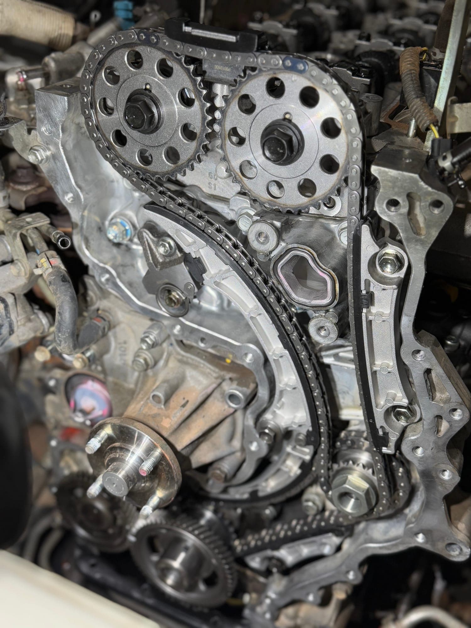 Timing chain and sprockets during an engine timing chain replacement