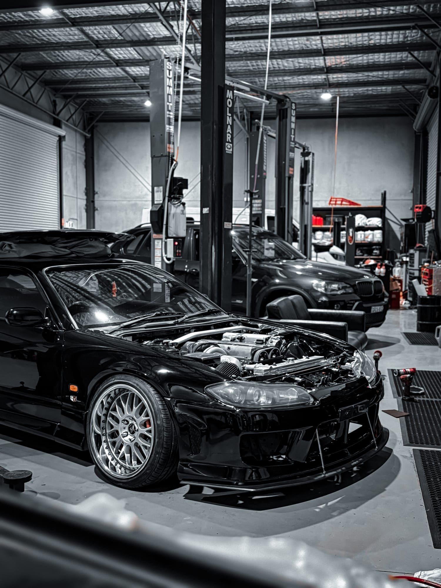 Nissan Silvia S15 in the workshop with turbo engine bay exposed