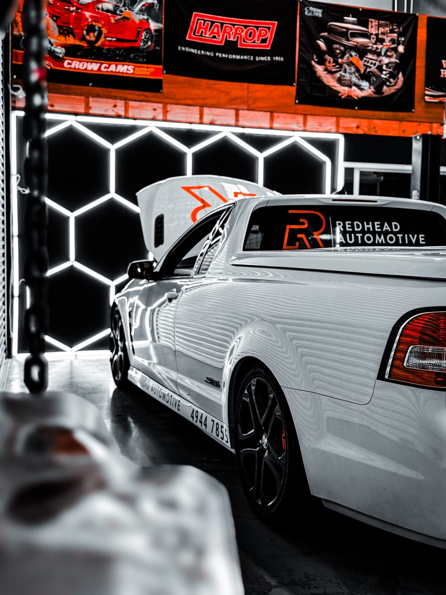 Redhead Automotive SS ute inside the workshop with hexagon light wall