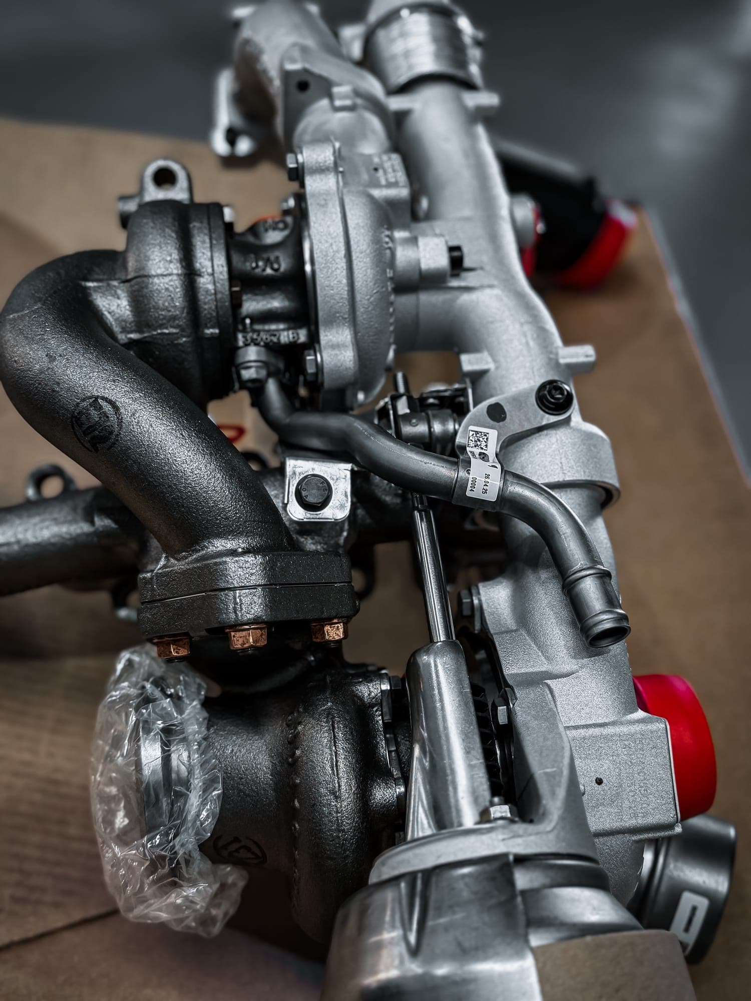 New twin turbochargers and manifold ready to fit